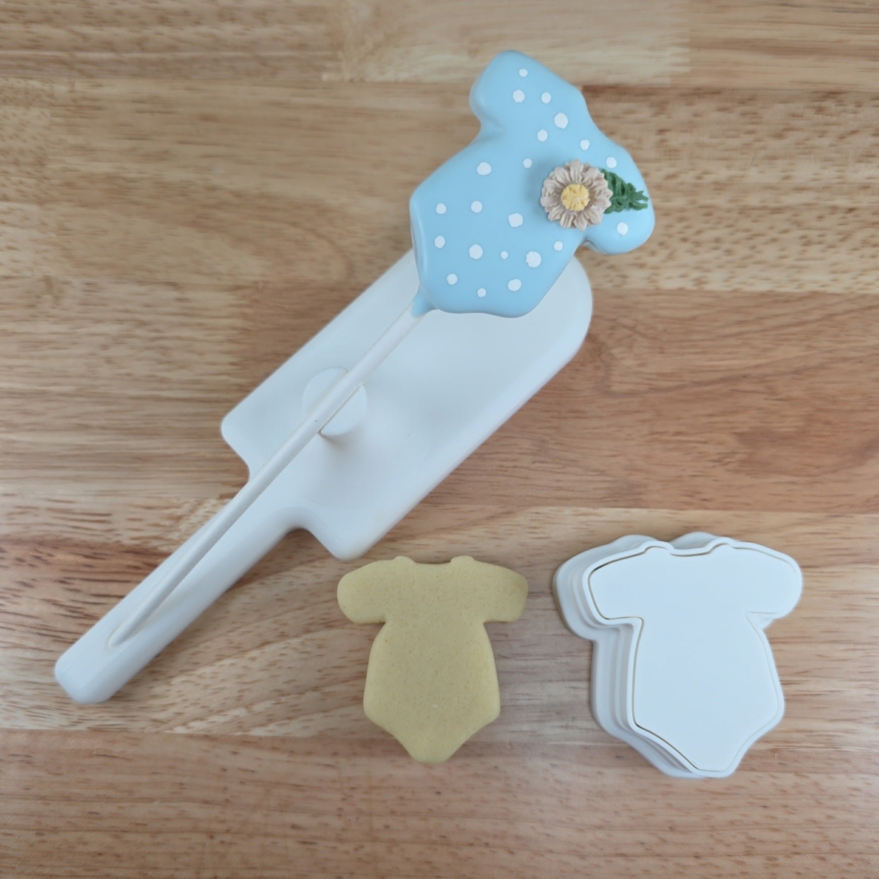 Onesie cake pop with cake pop cutter and cut dough