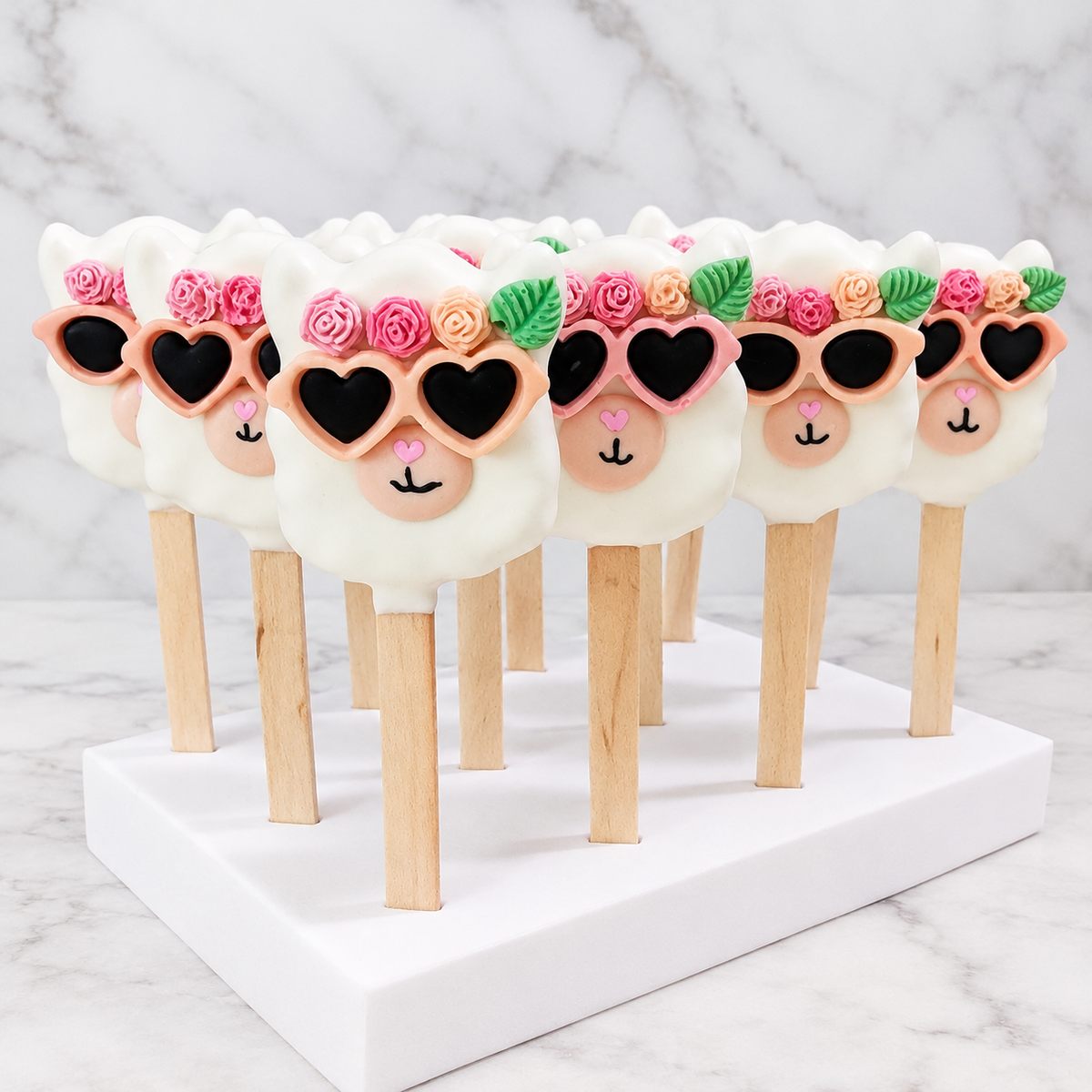 Cake pop stand with Llama cakesicles