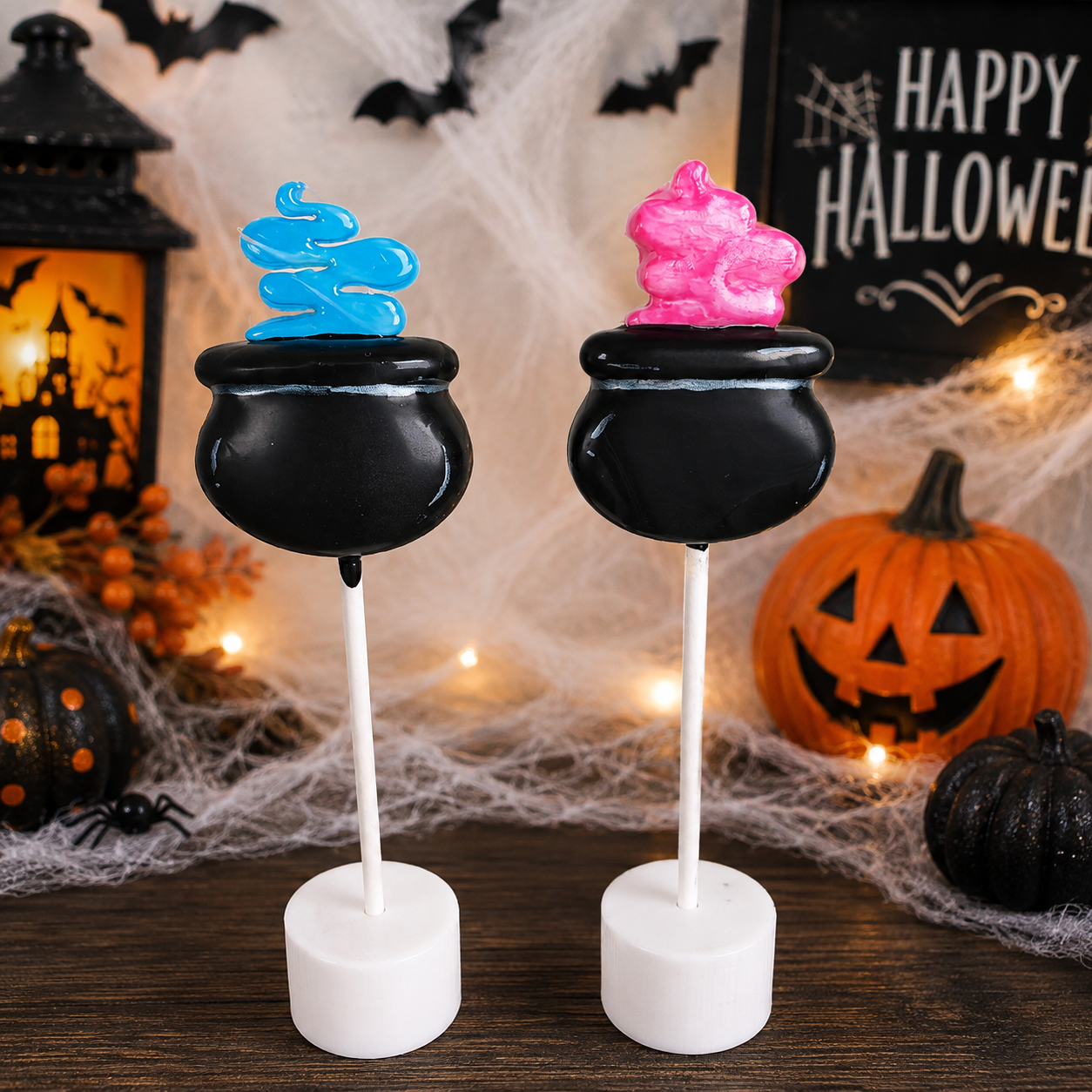 Two Halloween-themed cake pops