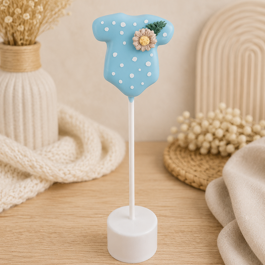 Blue onesie cake pop