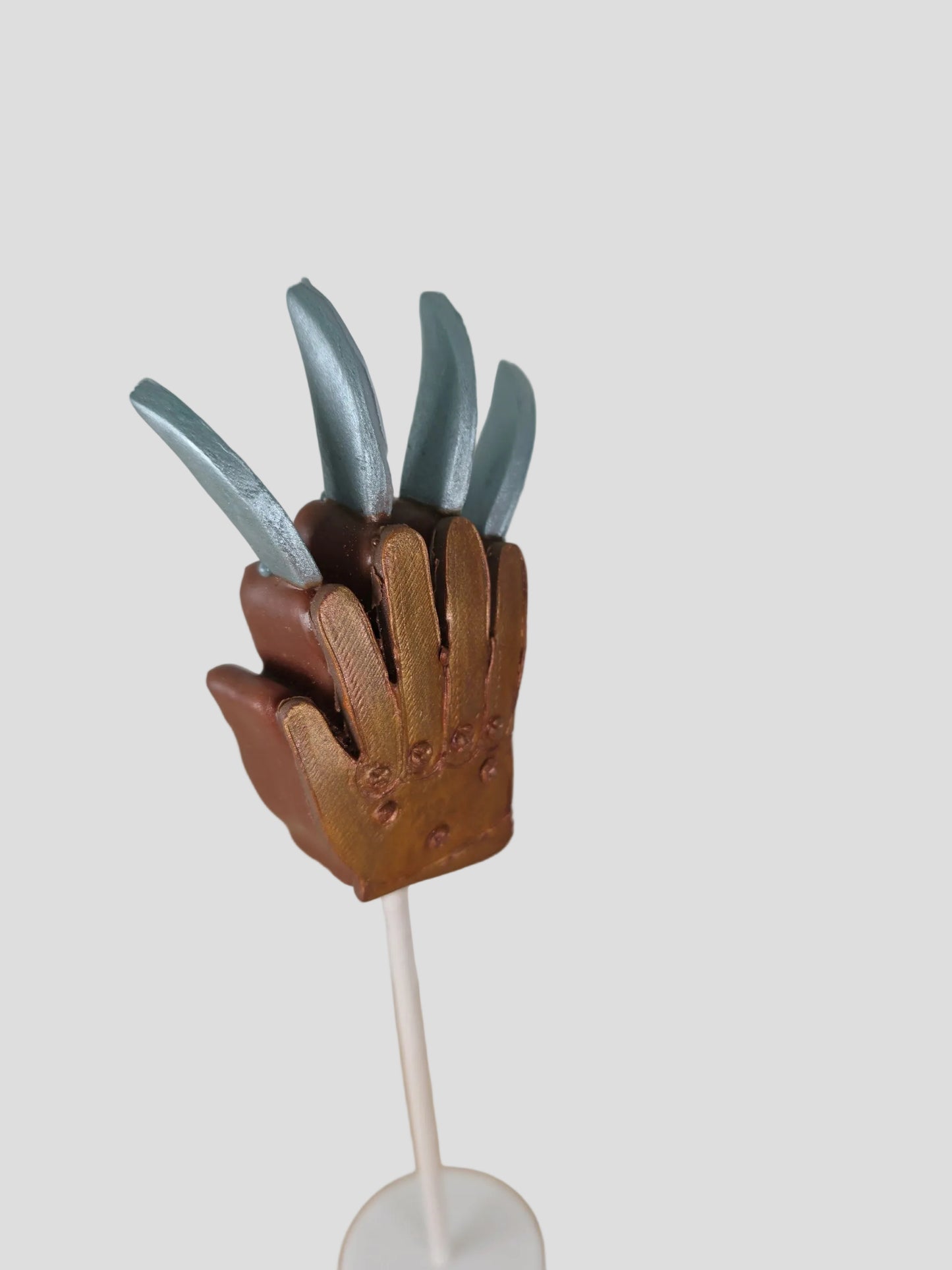 Slasher glove cake pop