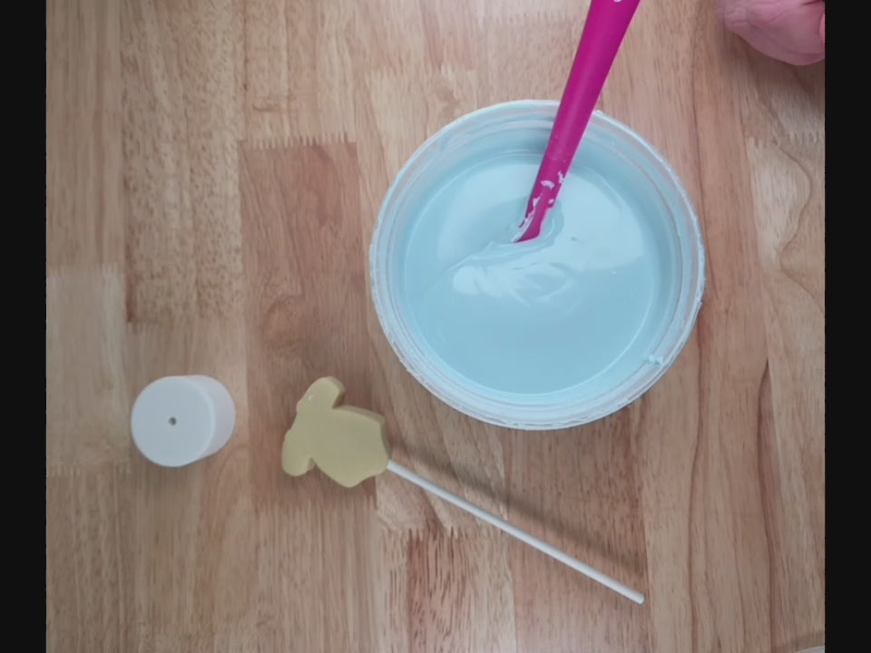 Dipping a onesie cake pop